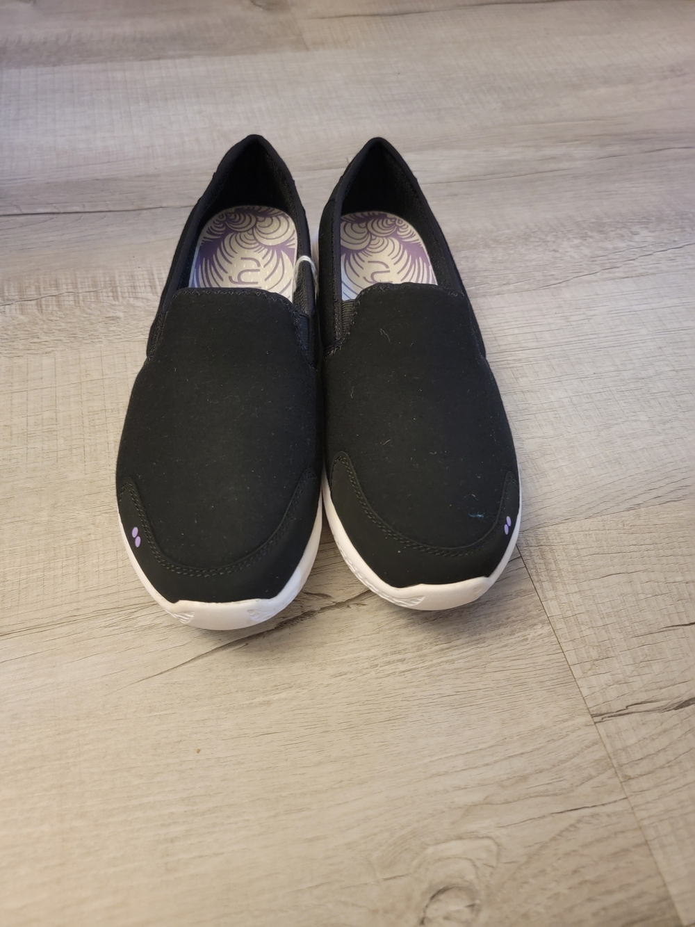 Ryka Black Slip-On Flats with Purple Accents